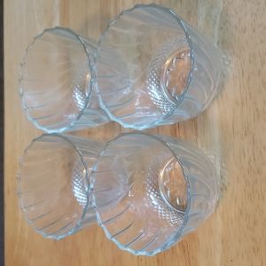 Set of 4 glass votive candle holders